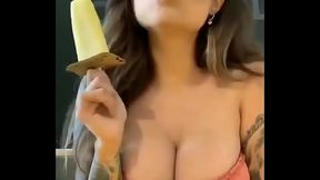 Gorgeous girl sucking big size ice cream