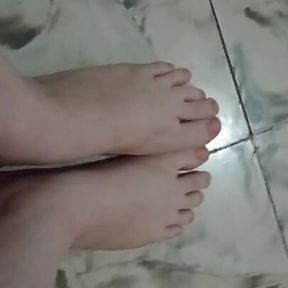 I send a video of me touching my feet so he can masturbate with me