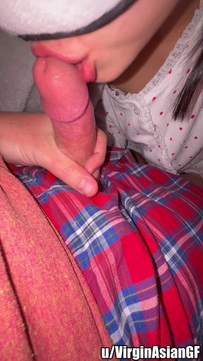 Teen Asian cutie gives a cute blowjob in homemade POV