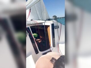 Giving fellatio on a boat