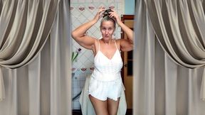 Hot mature housewife Lukerya undresses and teases with her huge tits in the kitchen