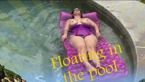 Floating in the pool