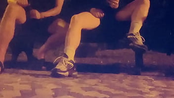 Amateur friends in a park, one is flashing his cock and gets a quick helping hand