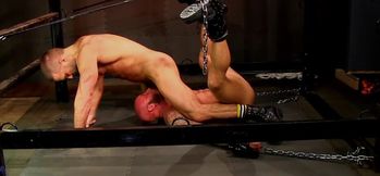 Muscular bear ass fucks his slave while the guy is being chained