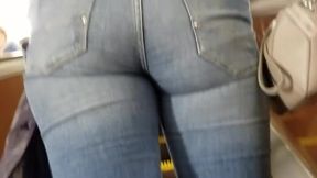 MILF's ass in tight jeans