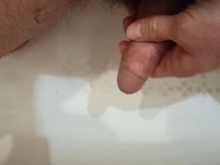 Pissing, spiting on the dickhead and wank in the baths.