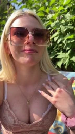 A nice teen is smoking coughing hocking and spitting loogies into a glass