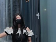 Chinese ladyboy in black tight skirt cums at the door of public toilet