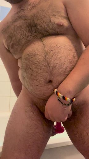 Bear is pleasuring himself in his bathroom