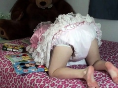 Taylor: Coloring in Pink Dress on Bed