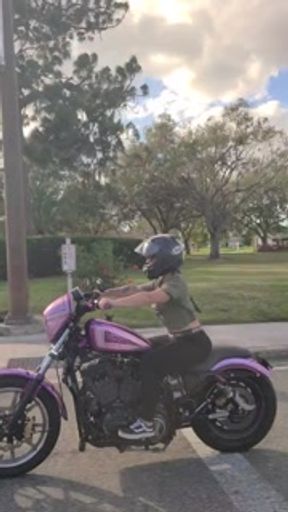 Bonnie public flashing while riding motorcycle