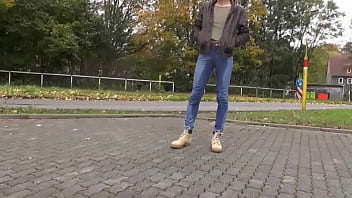 pissing in jeans on public road