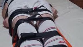 Miss M feet tickling on strapped down footballer