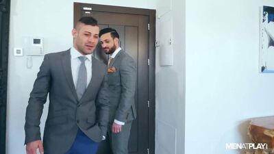 Two horny gay gentlemen are having sex on the couch