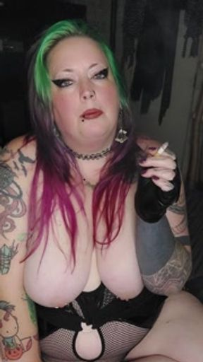Your chubby neighbor smokes a cigarette while playing with her big pierced