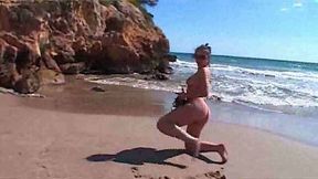 My bootylicous brunette babe posing naked on the beach