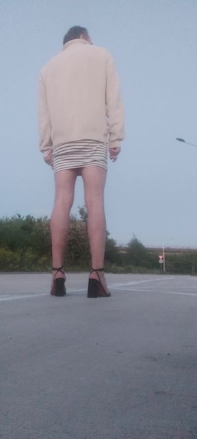 Crossdresser outdide in moorning parking