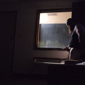 Jerking and cumming in motel window