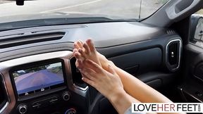 Hitchhiking hottie with sexy feet gets fucked in the car
