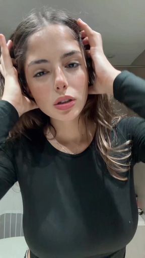 College student with big tits shows off her sexy side in a revealing outfit.
