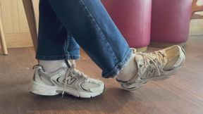 Coffee shop Shoeplay in sneakers and white socks