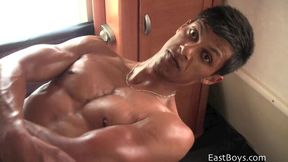 Akon shows his awesome muscles and then some