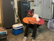 Putting riser pads on my roommates skateboard in my garage