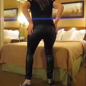 Crossdresser in leather pants