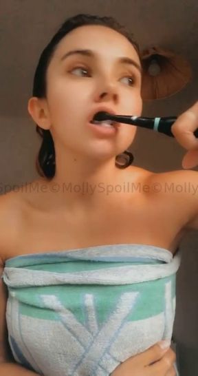 Brushing my teeth and spitting into the sink