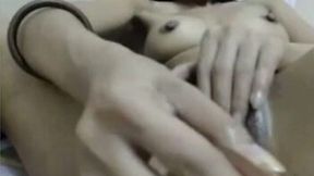 Kinky amateur Thai webcam nympho pet her hungry twat with toy