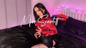 Scarlett's red satin blouse and leather skirt tease