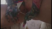 Busty tattooed blonde in tight shorts and micro bikini fingers pierced pussy and squirts all over floor