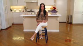 Giselle Mari gives an interview and strips for the viewers