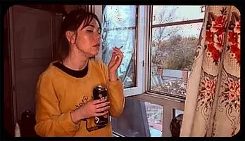 Sultry Asian Beauty Enjoys a Smoking Fetish Session