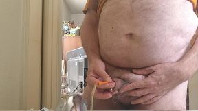 stuffguy #11 was going to simply jerk off but then decided to take a piss and use the catheter to get off.