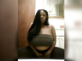 Black big beautiful woman boobs in brown