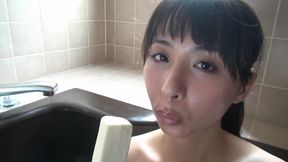 wet young Japanese Asian girl masturbates with icecream in bathtub