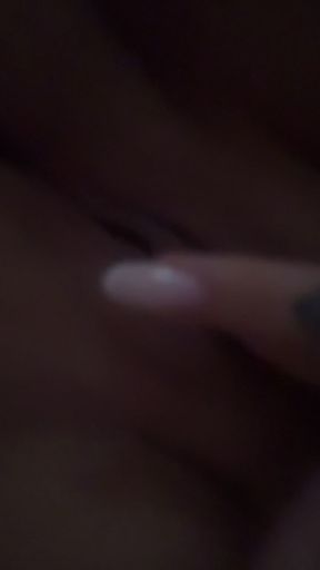 Masturbating