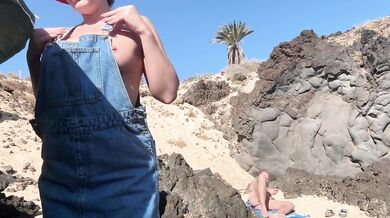 a girl undresses and jerks off in public in front of a stranger and he doesn’t pay attention