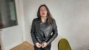 she will zippering her leather jacket aV