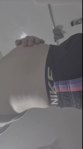 Young Man Holds a Full Bladder