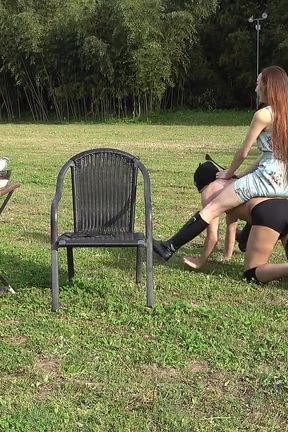 The Young Lady Enjoys a Stroll Across the Ranch Grassland, Riding a Ponyboy and Whipping Him