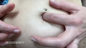 Rubbing Lotion on My Belly Button