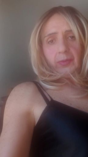 Vany sitting on the sofa in a room