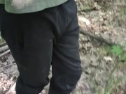 A young guy jerks off in the woods. the guy wants to have sex. sweatpants. sneakers. Pissing.