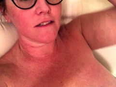 Redheaded amateur MILF with a sex toy on webcam show