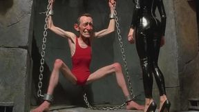 Dominatrix in Dungeon Kicks Helpless Man in the Balls
