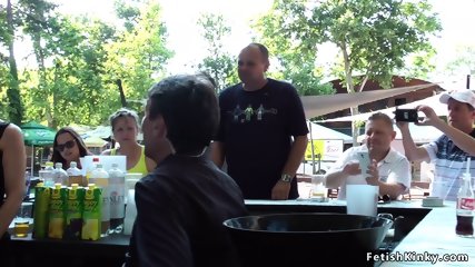 Euro slut sucking in public outdoor cafe