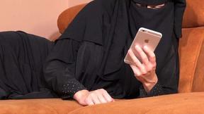 ”Black niqab & big black dildo”