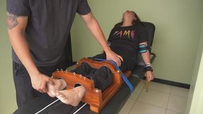 Our new model Sheila gets the tickle treatment in stocks (camera 2)